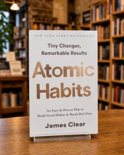 Atomic Habits by James Clear, sealed English edition in a bookshop | عادت‌های اتمی نسخه انگلیسی